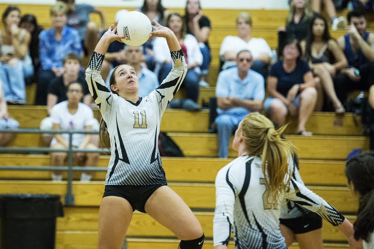Buhach Colony senior Mallory Pazin (11) sets the ball during a match against Golden Valley at Golden Valley High School in Merced, Calif., on Wednesday, Sept. 5, 2018. The Thunder beat the Cougars 3-0.