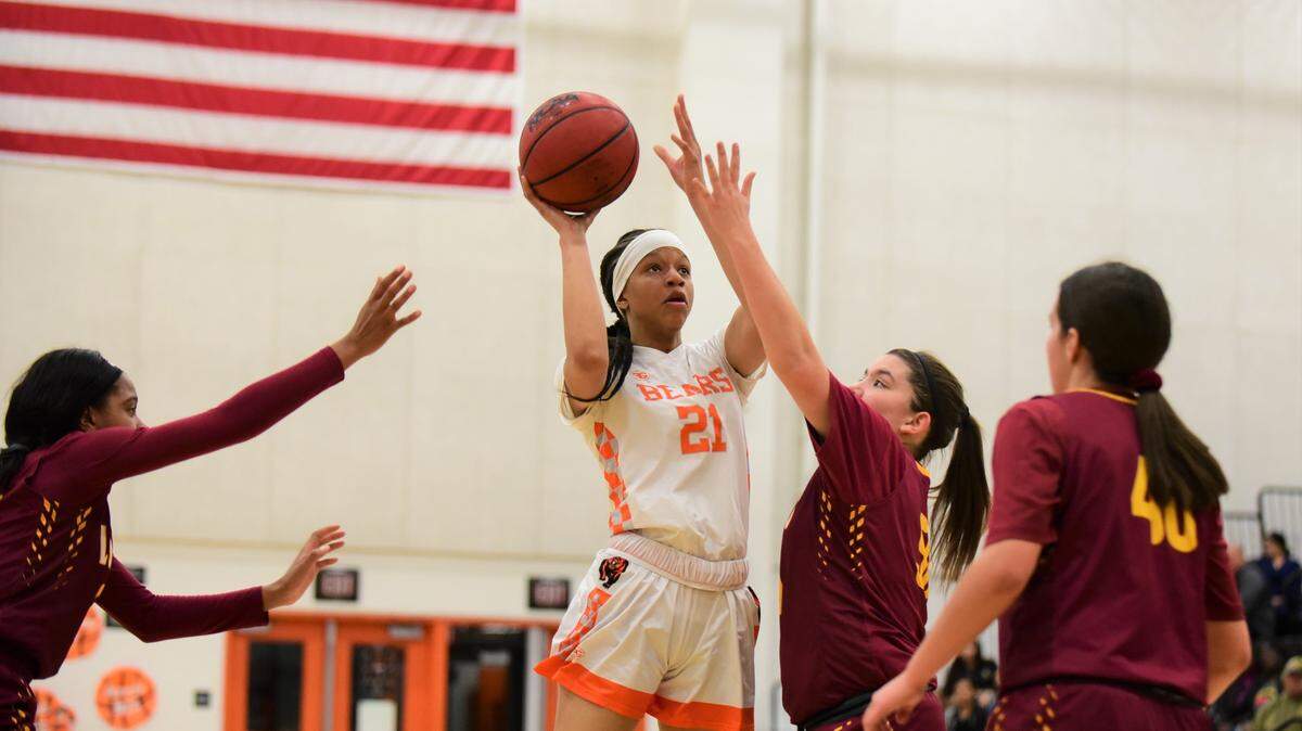 Merced High senior Khya Martin goes up for a shot against Los Banos during a playoff game at Merced High School on Tuesday, Feb. 18, 2020.