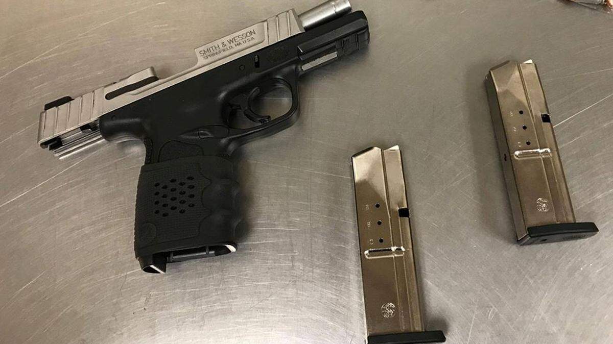 Four suspects were arrested on suspicion of firing shots and fighting on Saturday in Merced. A search of a home and vehicles uncovered a loaded Smith and Wesson 9mm semi-auto handgun.