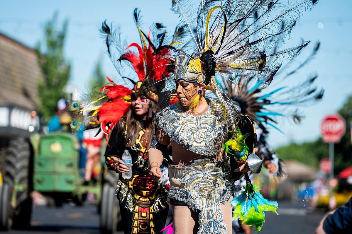 Dancers perform during a Fourth of July parade in Atwater, Calif., on Monday, July 4, 2022.