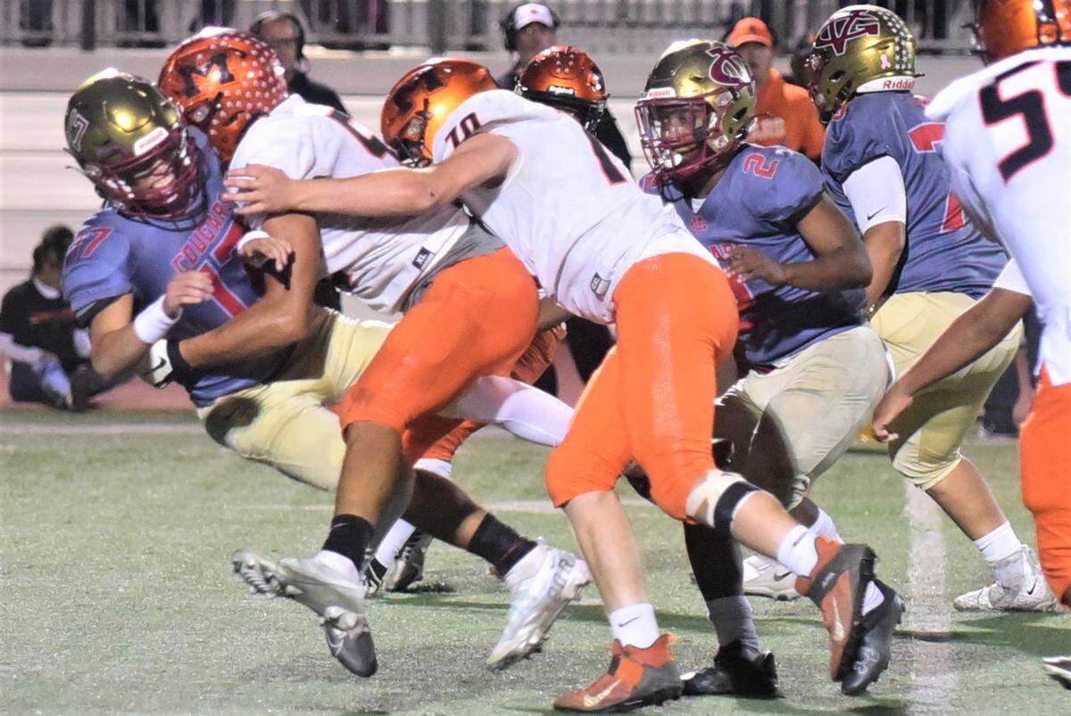 Merced High defensive lineman Jalonn Booth nails Golden Valley quarterback Abraham Bautista during the first half of the Bears’ 31-6 win over Golden Valley in the Battle for the Mayor’s Cup on Friday, Oct. 28, 2022 at Veterans Stadium in Merced, Calif.