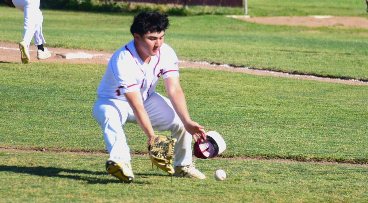 Golden Valley High School senior pitcher Ryan Saechao (4) fields a bunt back to the mound during a baseball game against El Capitan at Doug Fister Field on Tuesday, March 26, 2024.