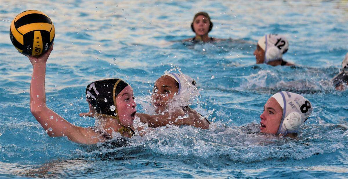 Buhach Colony’s Eliza Marquez fires a shot during a water polo game against El Capitan on Tuesday, Oct. 25, 2022 at Buhach Colony High School in Atwater, Calif.