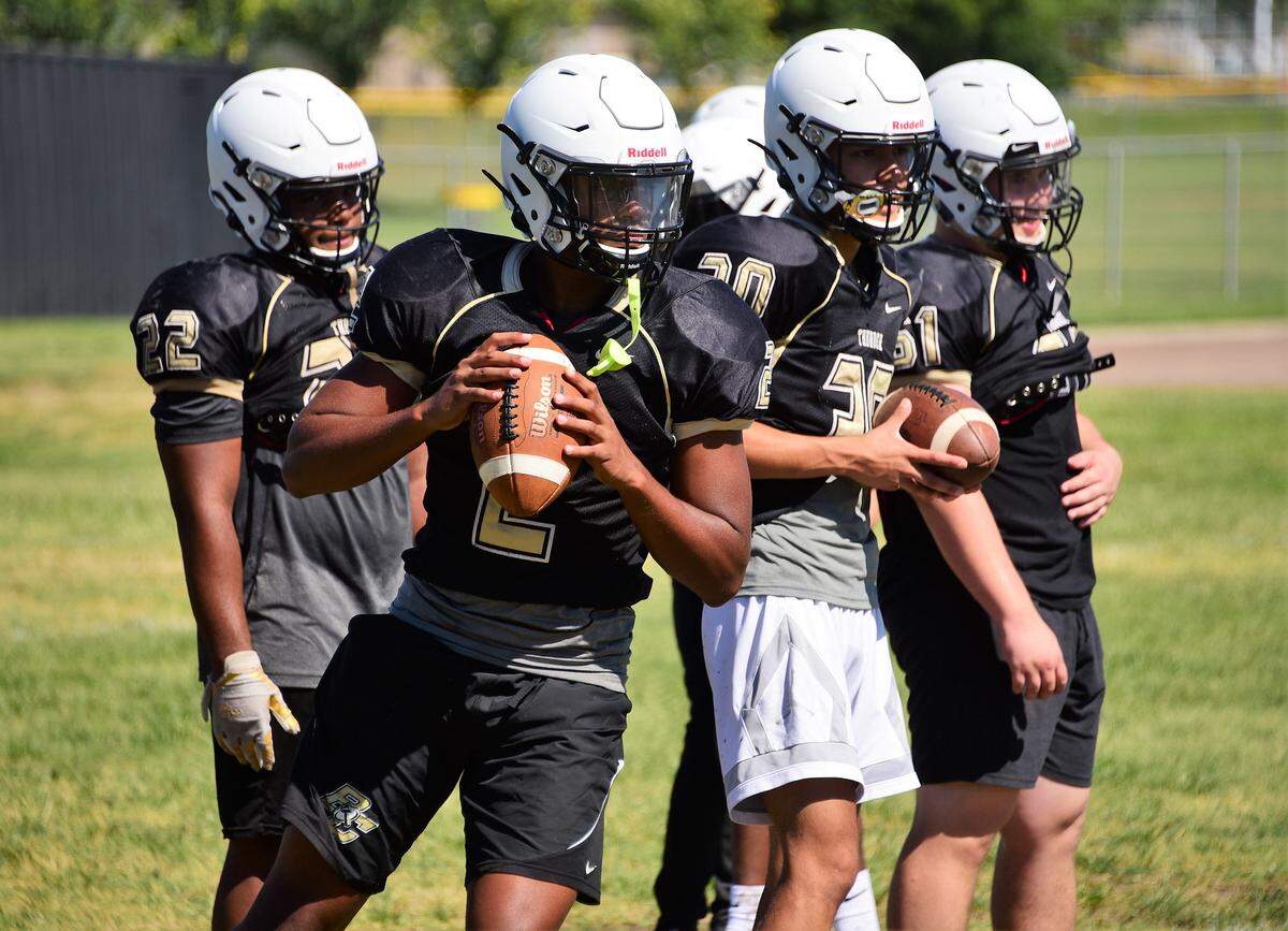 Buhach Colony senior Trey Paster takes some reps at quarterback during a Thunder practice this summer. Paster will be used in a variety of ways this season by Buhach Colony.