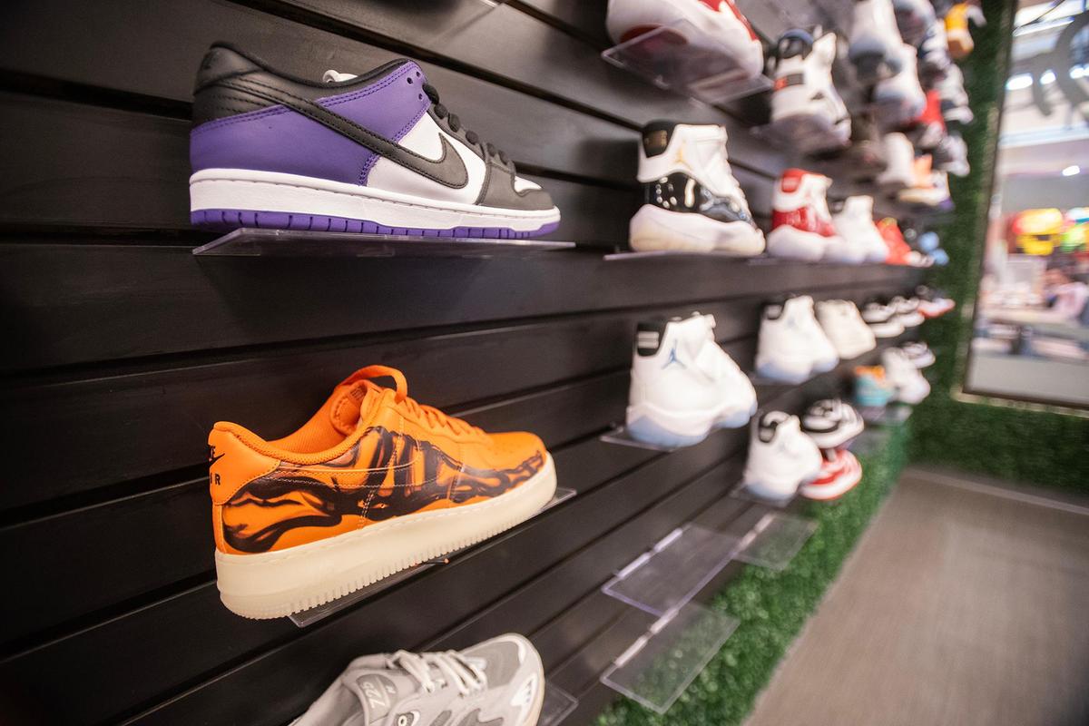 Sneakers for sale are displayed on the wall inside The Come Up Kickz located inside the Marketplace at Merced in Merced, Calif., on Friday, May 16, 2025. The business sells, buys and trades merchandise such as sneakers, collectibles, designer items and clothing.