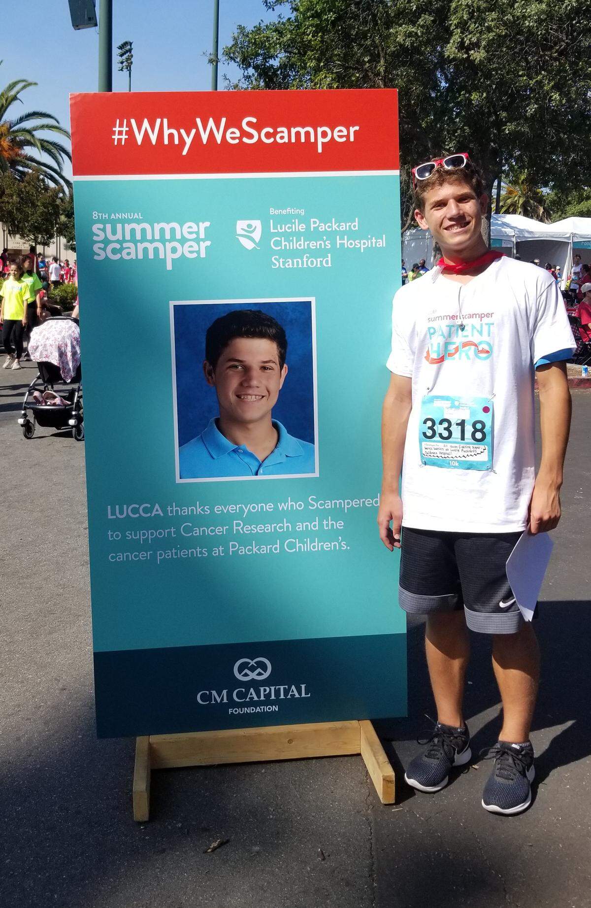 Lucca Lorenzi poses for a photo at the Summer Scamper in Palo Alto on Sunday, June, 24, 2018.