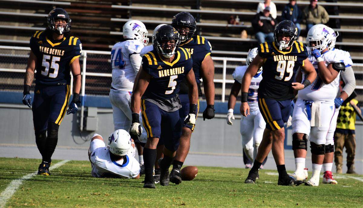 Merced College freshman Jaylen Thao-Booth reacts after recording one of his three sacks during a 41-14 win over West Hills Coalinga on Saturday, Nov. 12, 2022 at Stadium ’76.