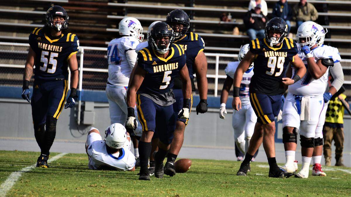 Merced College freshman Jaylen Thao-Booth reacts after recording one of his three sacks during a 41-14 win over West Hills Coalinga on Saturday, Nov. 12, 2022 at Stadium ’76.
