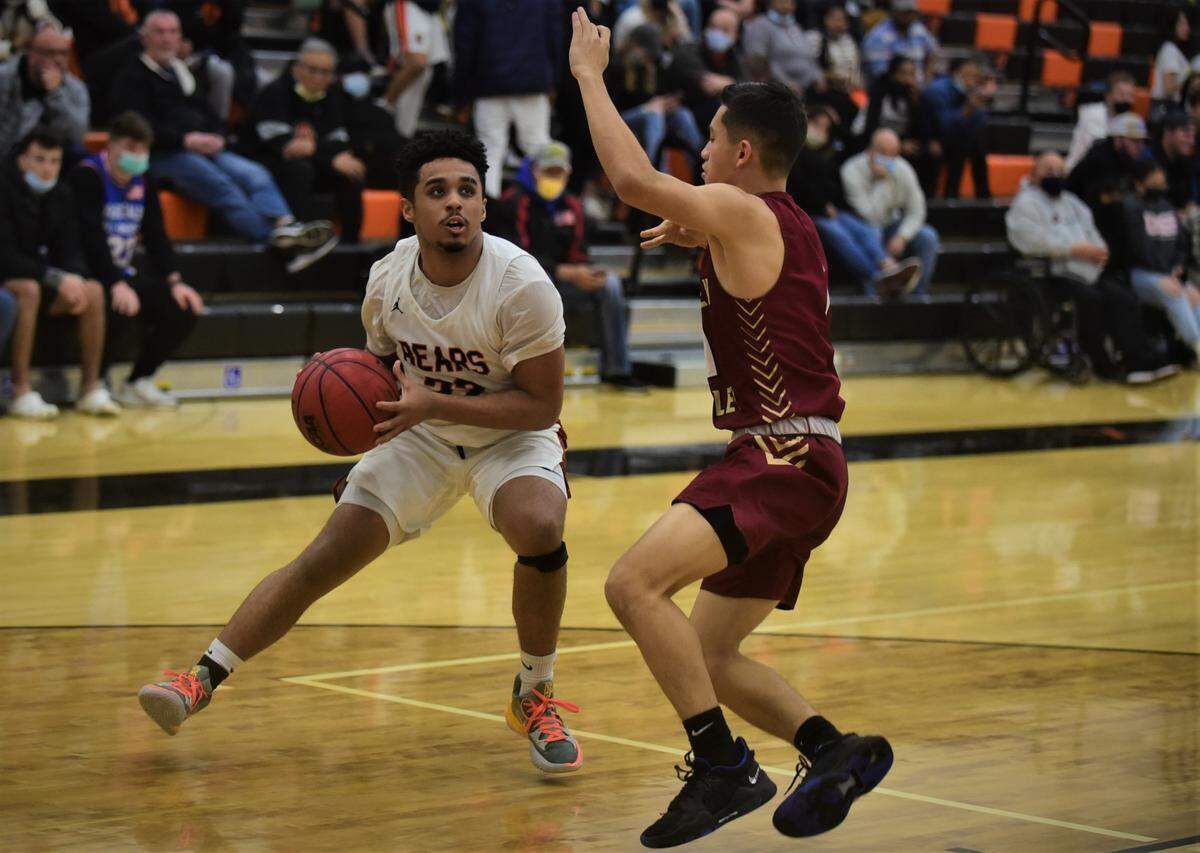Merced High senior Seth Mays-Meneley looks for a path to the basket during a game against Golden Valley on Friday, Jan. 21, 2021 at Merced High School in Merced, Calif.