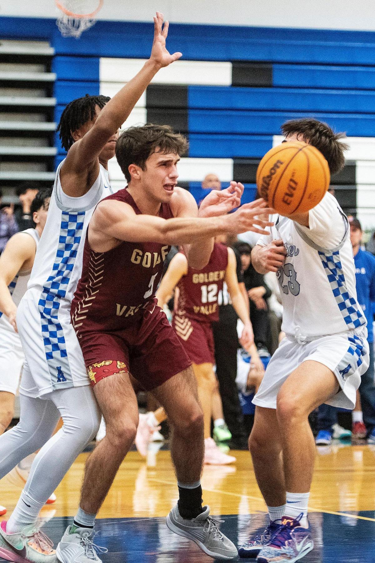 Golden Valley senior Joseph Spielman (5) passes the ball during a game against Atwater at Atwater High School in Atwater, Calif., on Monday, Jan. 29, 2024.