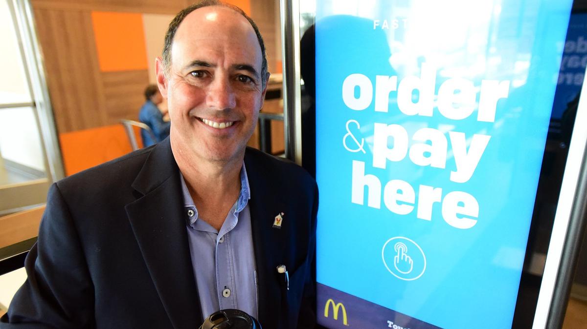 Owner Jim Abbate stands next to a touchscreen menu at Atwater’s Shaffer Road McDonald’s, which recently got some technological upgrades including the screens and service through the smartphone app, Abbate said on Thursday, Sept. 27, 2018.