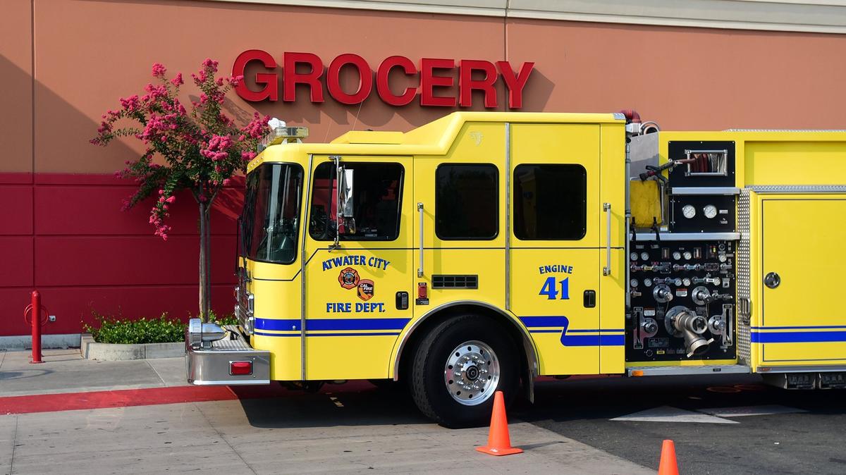 An Atwater fire engine and cleanup crews were parked outside of the Super Target in Atwater on Wednesday, Aug. 8, 2018, the day after someone set a fire inside the store. The store was closed to customers on Wednesday.