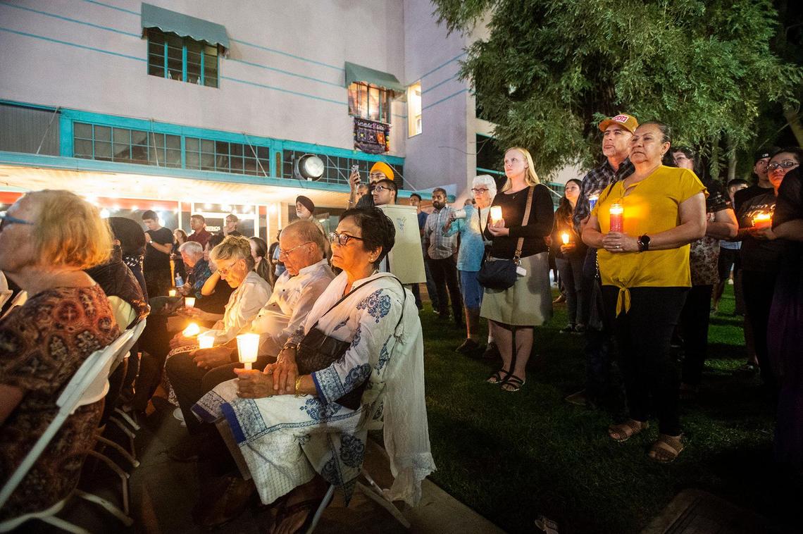 People gather during a vigil for 8-month-old Aroohi Dheri, her parents Jasleen Kaur, 27, and Jasdeep Singh, 36, and her uncle Amandeep Singh, 39, at Bob Hart Square in Merced, Calif., on Sunday, Oct. 9, 2022. All four kidnapping victims were found dead in a rural area of Merced County north of Dos Palos on Oct. 5. Authorities said the family was kidnapped at gunpoint from a Merced County business on Oct. 3.