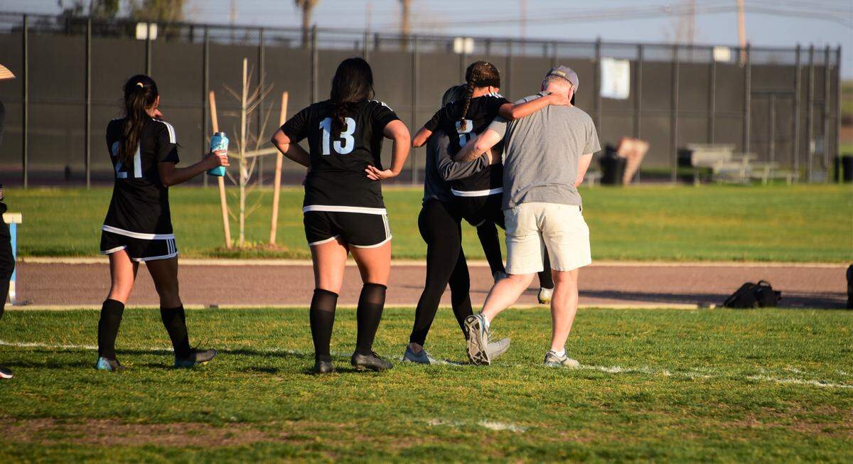 El Capitan star Anaya Shelton (8) is carried off the field after suffering an ankle injury during a playoff match against Rosemont on Wednesday, Feb. 19, 2020 at El Capitan High School.