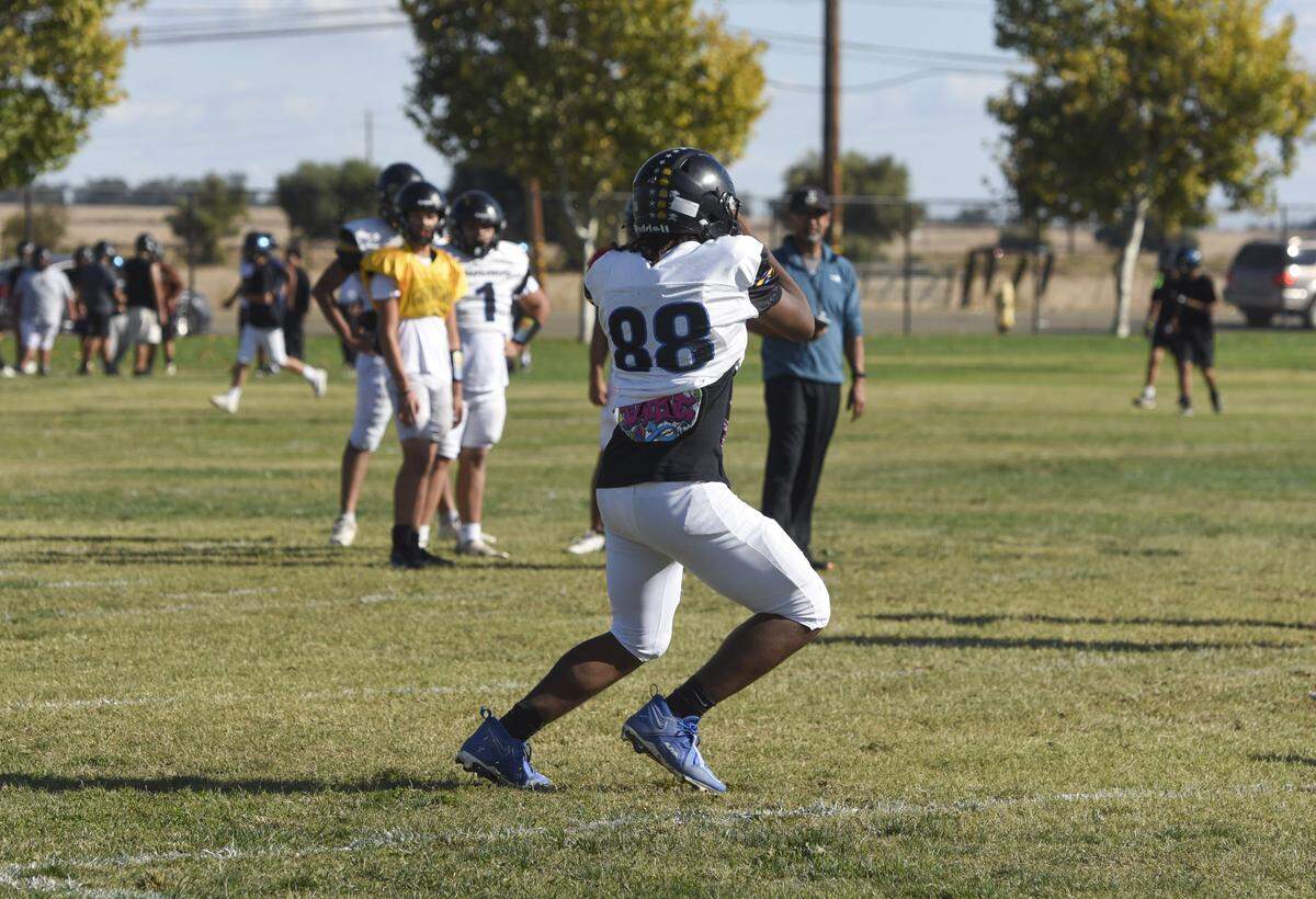 El Capitan junior tight end Charles Polk hauls in a pass during an October practice. Polk is expected to be one of the Gauchos’ key returning leaders next season.