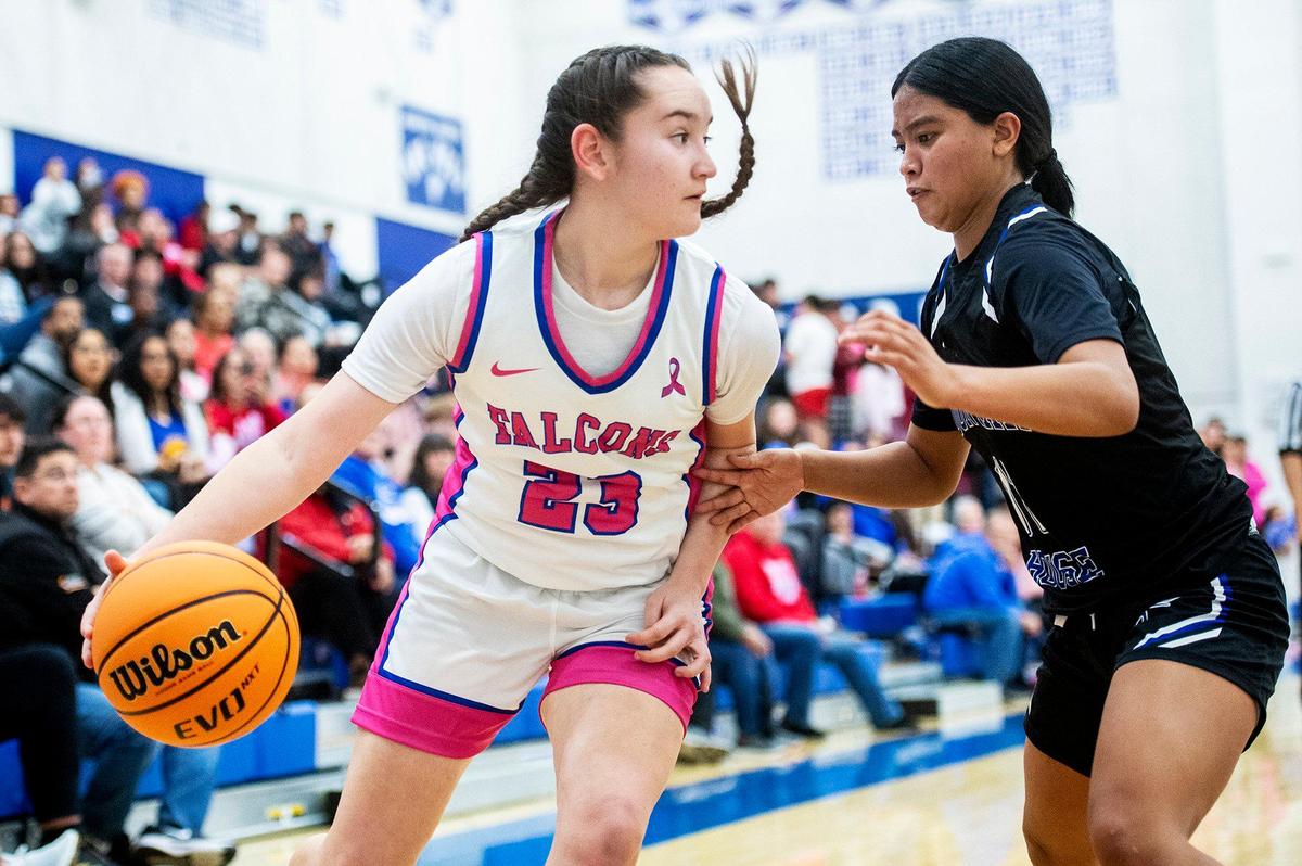 Atwater junior Elvita Mota (23) dribbles toward the basket during a CIF Sac-Joaquin Section Division 2 playoff game against Mountain House at Atwater High School in Atwater, Calif., on Wednesday, Feb. 14, 2024. The Falcons beat the Mustangs 95-59.
