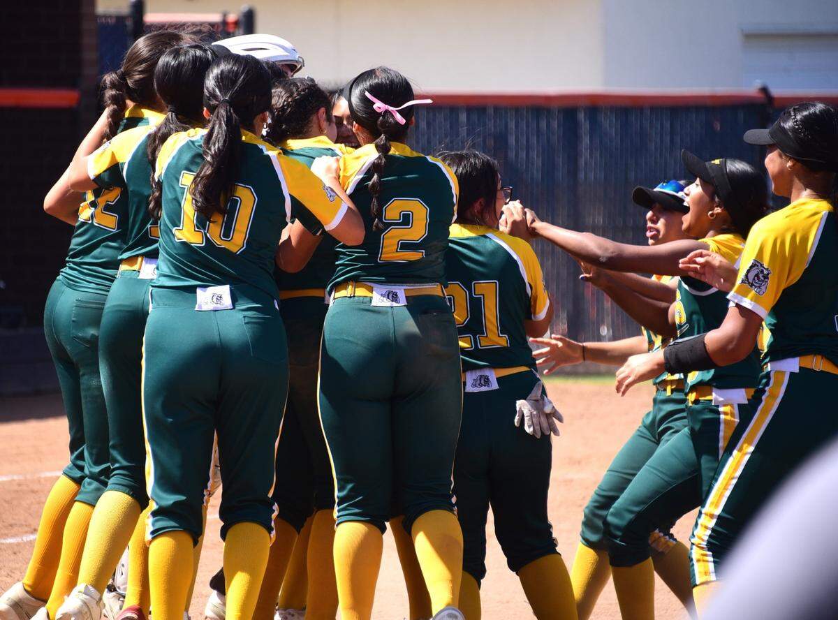The Le Grand High softball players celebrate after the final out of their 5-2 win over Stone Ridge Christian in the Sac-Joaquin Section Division VI championship game on Saturday, May 18, 2024 at Cosumnes River College in Sacramento, Calif.