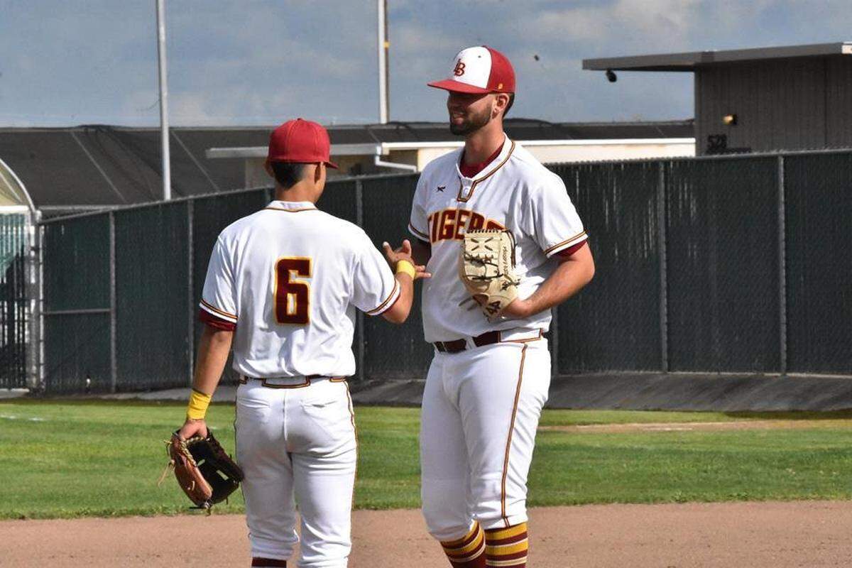 Max Ramirez (6) and Kody Cardoza (right) have been dominant on the mound for the Los Banos High baseball team this season.