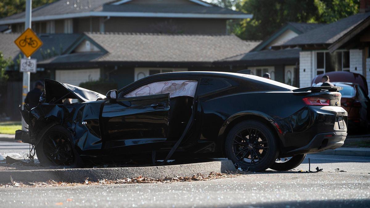 Authorities investigate the scene of a fatal collision involving a Chevrolet Camaro and a Nissan Altima at the intersection of M Street and Buena Vista Drive. According to Merced Police Sgt. Nathan McKinnon, a 25-year-old man was driving the Chevrolet south on M Street when the front of the vehicle collided with the Nissan driven by a 67-year-old woman eastbound on Buena Vista Drive. McKinnon said life-saving measures were attempted by the woman died of injuries suffered in the collision. A minor passenger in the Nissan was not injured.