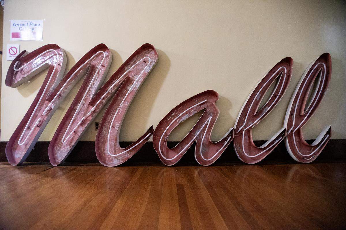 The former Merced Mall neon sign sits on the ground floor of the Merced County Courthouse Museum in Merced, Calif., on Friday, Aug. 1, 2025. The sign was removed from one of the mall’s entrances in July. 