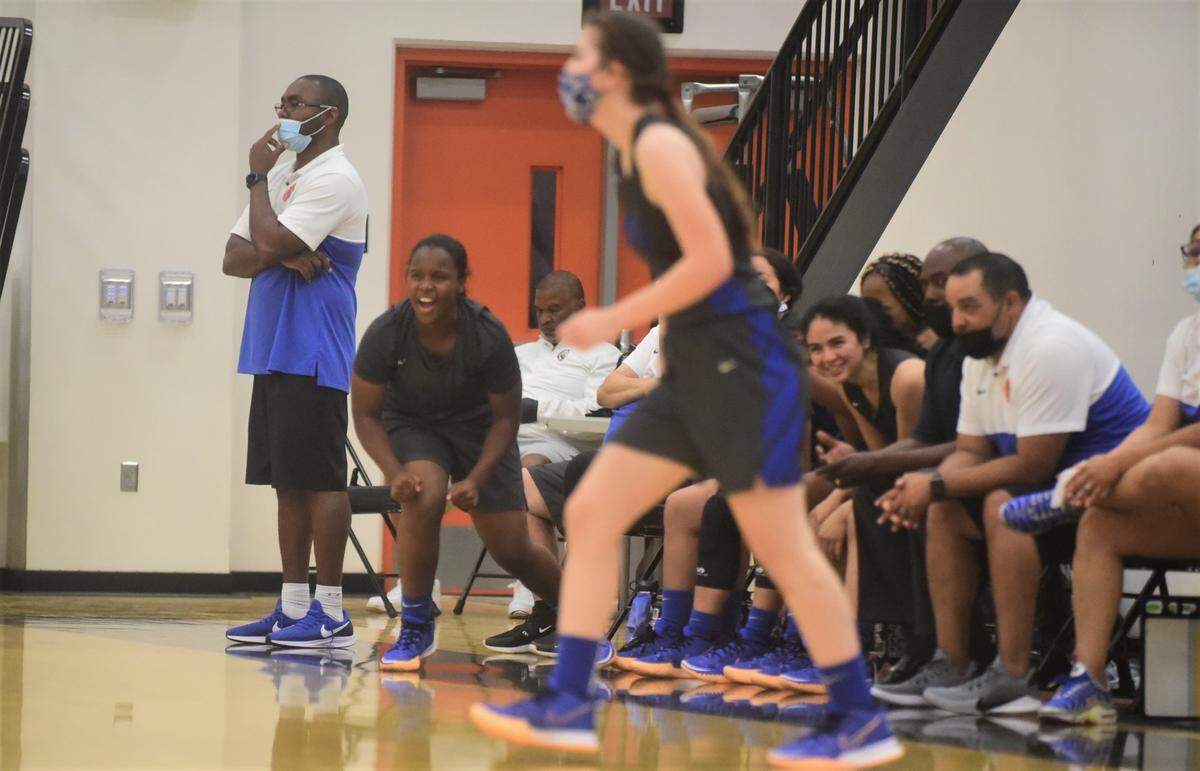 Atwater High senior Amoni Claiborne cheers on her teammates during a 77-17 win over Merced on Tuesday, May 11, 2021 at Merced High School.