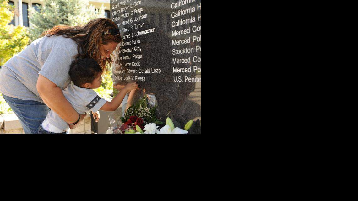 Terry Rivera is angry about the plea deal with James Ninete Leon Guerrero, saying it amounts to “slapping him on the hand.” She and her grandson Matthew Contreras stands at a memorial on which son Jose Rivera’s name is engraved.