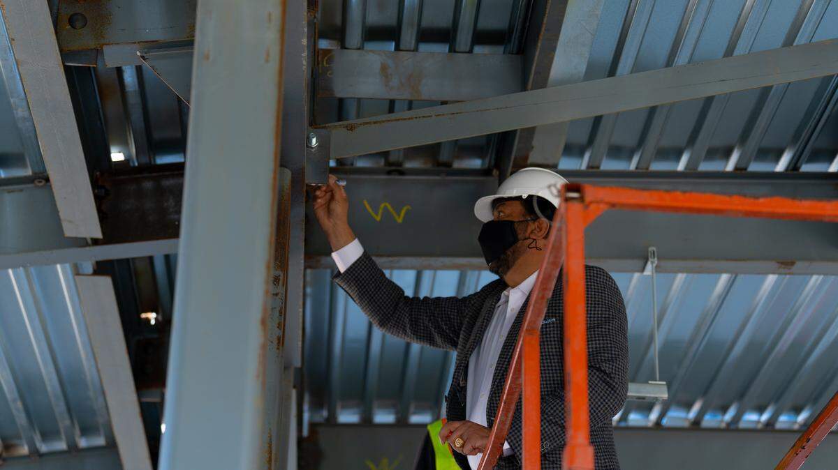 Merced College celebrates “topping-off” the tallest beam of it’s new Raj Kahlon Agriculture and Industrial Technology Complex on Thursday, Jan. 19, 2022.