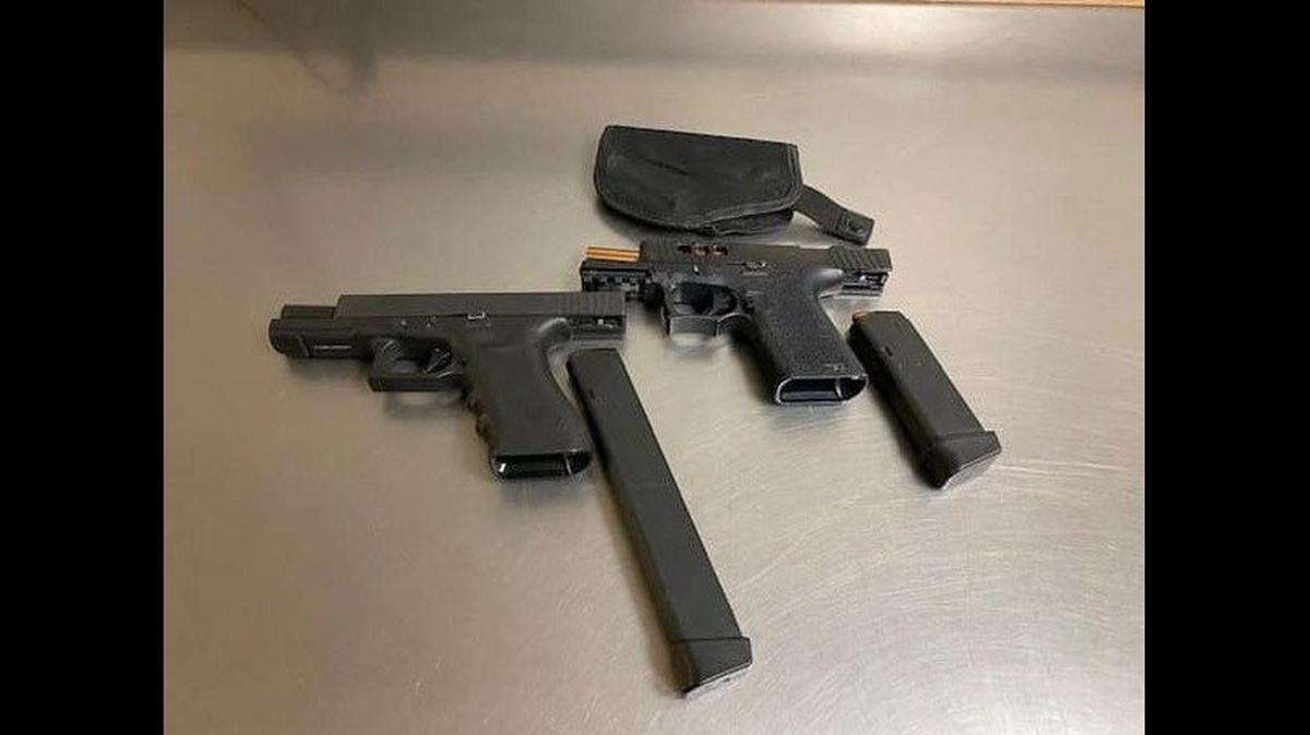 Two men police said are gang members at a house party Friday, according to the Merced Police Department. The men were found to have firearms tucked into their waistband.