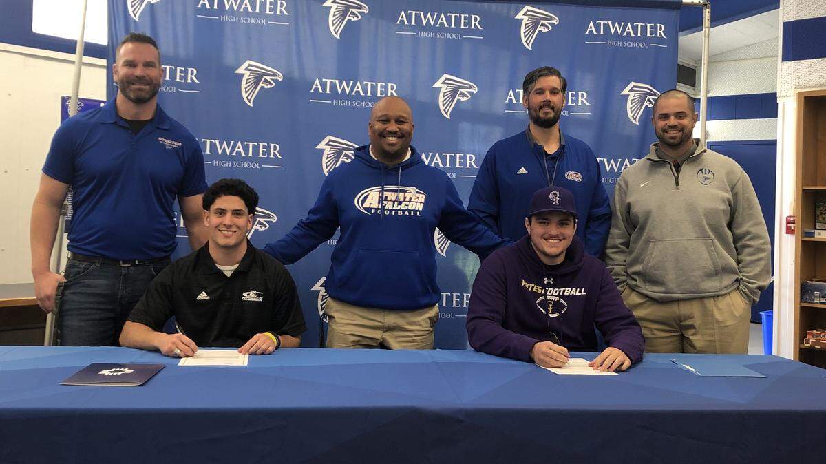 Atwater Football coaches with Nate Moore (left) and Sam Jenkins (right) as they sign their letter of intent. Coaches left to right: Seth Gunnin, Seneca Ybarra, Nick Rae, and Nelson Medeiros