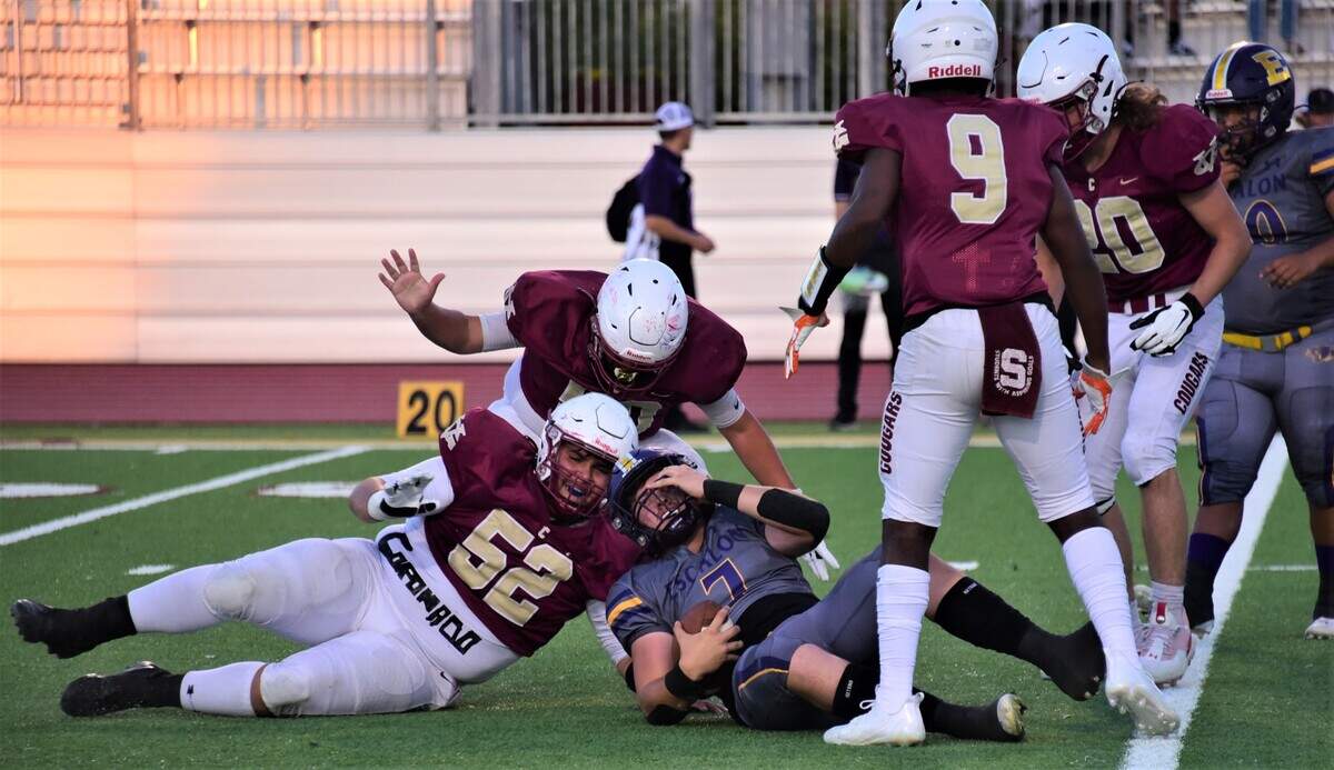 Golden Valley High School senior defensive lineman Jacob Coronado (62) reacts after sacking Escalon quarterback Donovan Rozevink (7) during a game on Friday, Aug. 18, 2023 at Veterans Stadium in Merced, Calif.