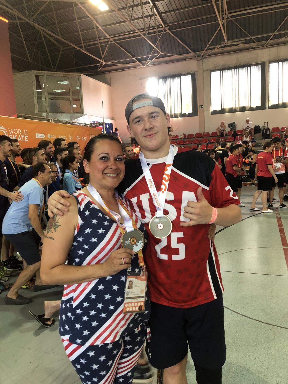 Merced’s Tyler Van Winkle (25) poses for photo with his mother Carrie Craft, who is a team manager. Van Winkle and the Men’s USA Roller Derby team won the gold medal, going 6-0, at the World Roller Games in Barcelona, Spain.