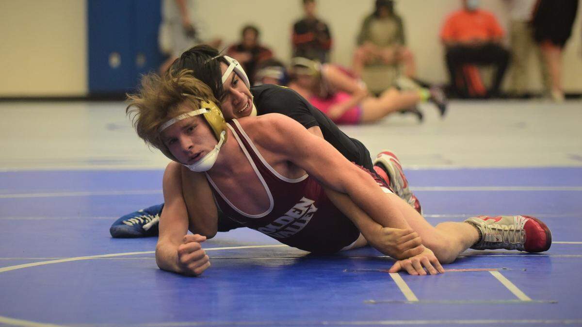 El Capitan senior Jesus Garcia wrestles against Golden Valley’s Chance Hose in the 138-pound championship match during the Central California Conference Tournament on Wednesday, June 9, 2021 at Atwater High in Atwater, Calif.