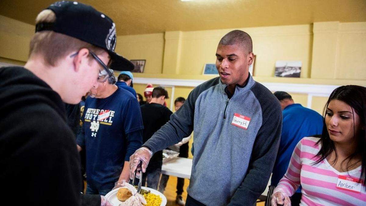 On Thanksgiving Day 2016, Garry Harris III and the former Amber Gutierrez volunteer on the serving line during the Merced County Rescue Mission Thanksgiving Day meal. Now newlyweds, Garry and Amber are appearing Monday night on the “Wheel of Fortune” television game show.