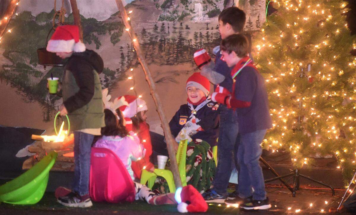 Merced Cub Scouts were one of the many displays set up along Main Street for Merced’s Christmas Tree Lane “reverse parade” on Saturday, Dec. 4, 2021 in Merced, Calif.