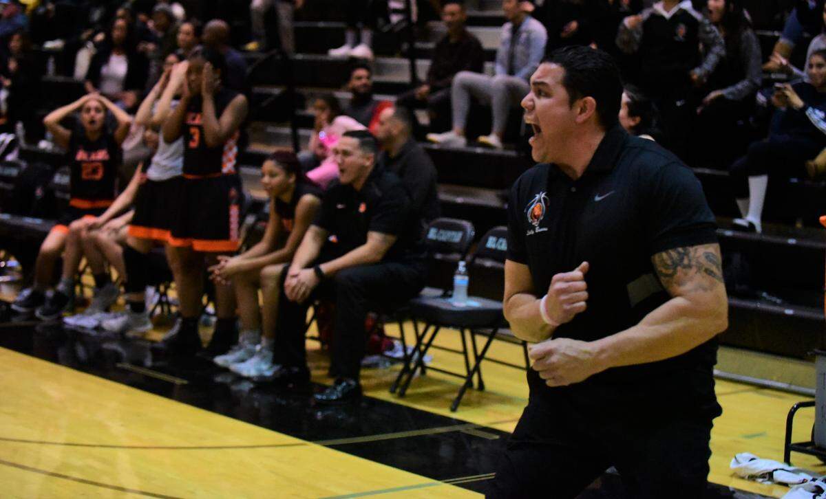 Merced High girls basketball coach Art Solis reacts after a call goes against the Bears against El Capitan on Thursday, Jan. 9, 2020 at El Capitan High.
