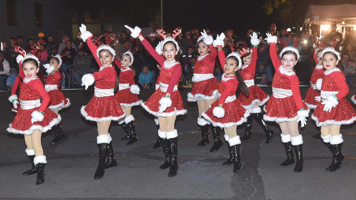 Members of Francine Turner’s Dance Explosion perform for the judges Friday night, Dec. 7, 2019 during the annual Los Banos Downtown Christmas Parade sponsord by Republic Services and Coldwell Banker Kaljian & Associates. Thousands of people lined the streets of downtown Los Banos to enjoy the, “Christmas Magic” themed parade which takes place annually the first Friday of December. There were 10 first place awards presented in the following catetories: Chamber President’s Award: Cowboy Christmas. Parade Sponsors Award: Seventh Day Adventist Church; Arts Council Award: Century 21 MM & Associates. Mayor’s Award: Henry Miller Elementary School. Christmas Present: Bernie Mixology. Spirit Award: Creekside Junior High School Dance Club. Gingerbread Award: Ingomark Packing. I Believe in Christmas: Pacheco High School Band. Christmas Elves Award: Los Banos Community 4H. Spirit of Christmas Award: Operation Packing Company.