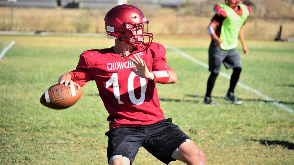 Chowchilla High School quarterback Benson Soares throws the ball during practice on Wednesday, Aug. 10, 2022.