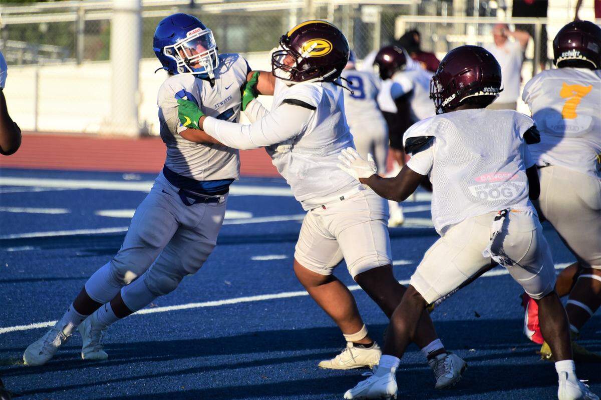 Atwater High School senior Max Coleman (5) rushes the quarterback during a scrimmage against Edison of Stockton on Friday, Aug. 11, 2023 at Dave Honey Stadium in Atwater, Calif.