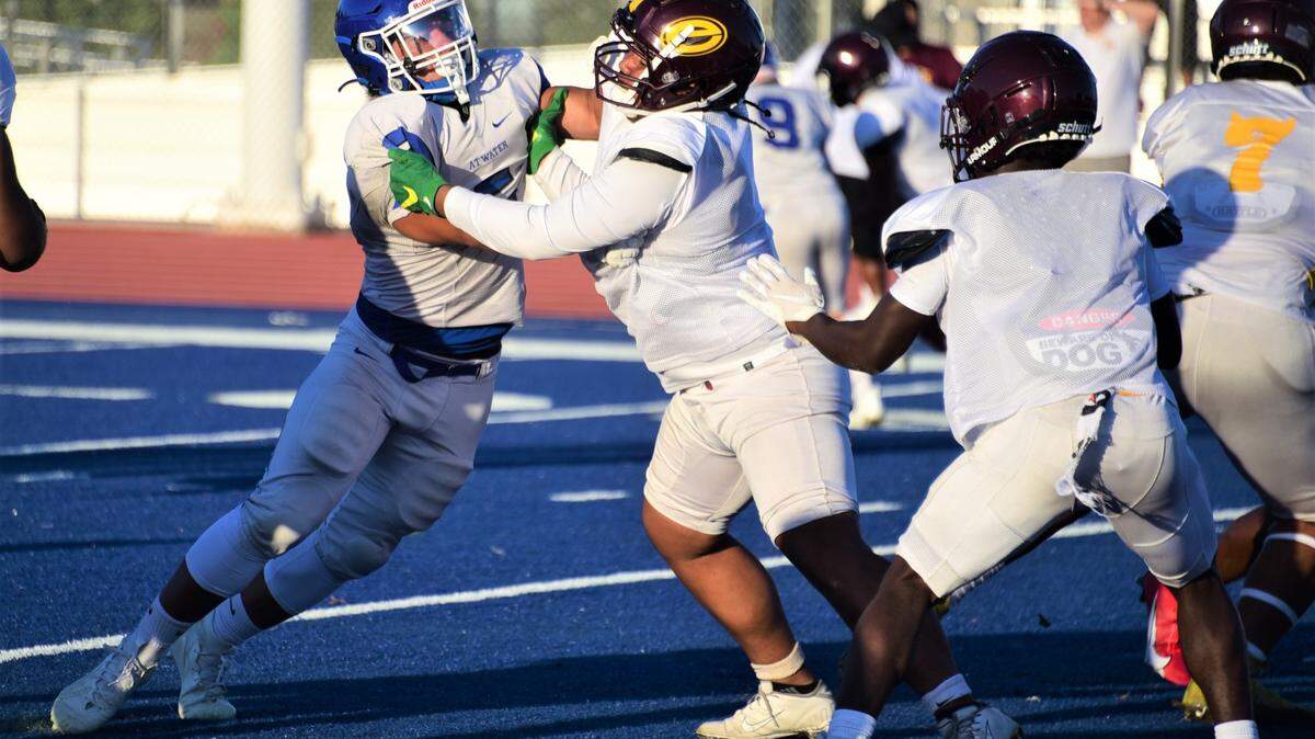 Atwater High School senior Max Coleman (5) rushes the quarterback during a scrimmage against Edison of Stockton on Friday, Aug. 11, 2023 at Dave Honey Stadium in Atwater, Calif.