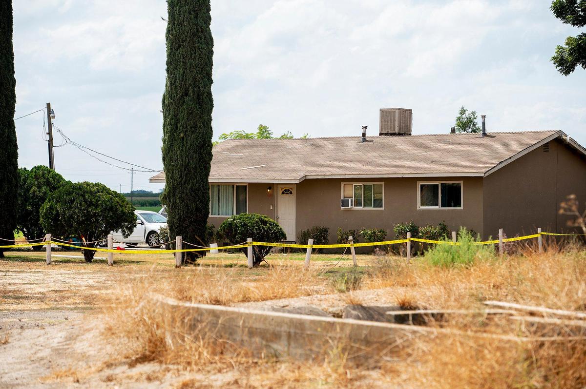 The Merced County Sheriff’s Office investigates the scene of a homicide after a woman was found dead with a gunshot wound at a residence in the 4600 block of Lingard Road in Merced County, Calif., on Sunday, Sept. 3, 2023.