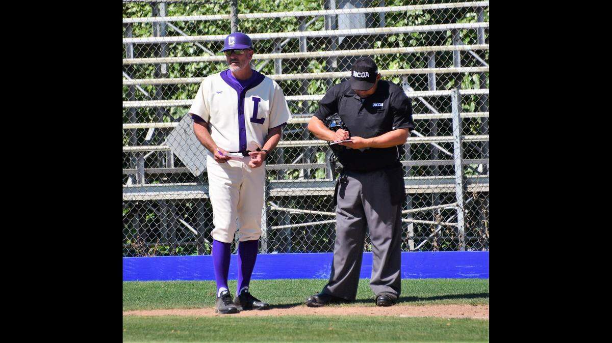 Livingston High coach Matt Winton (left) was named a Sac-Joaquin Section Model Coach Award winner on Tuesday, Jan. 11, 2022 by the Sac-Joaquin Section.