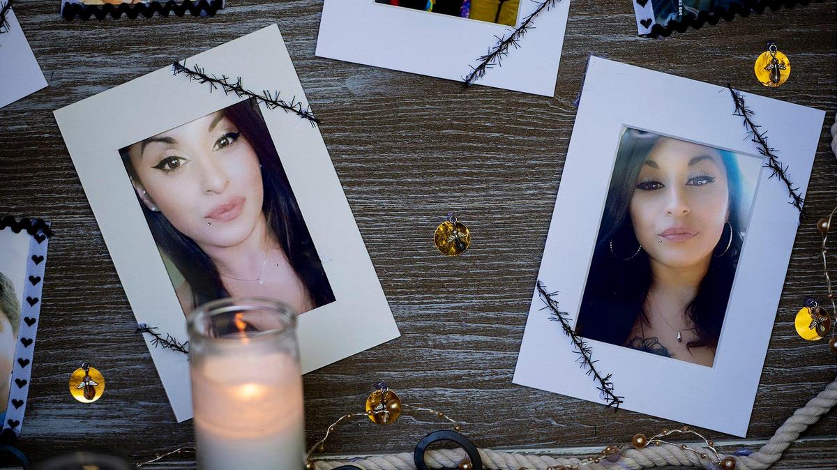 A memorial for 33-year-old Christina Velez is seen on the front porch of her home in Merced, Calif., on Tuesday, Nov. 2, 2021. According to family and friends, Velez was killed in a shooting at the home on Oct. 30.