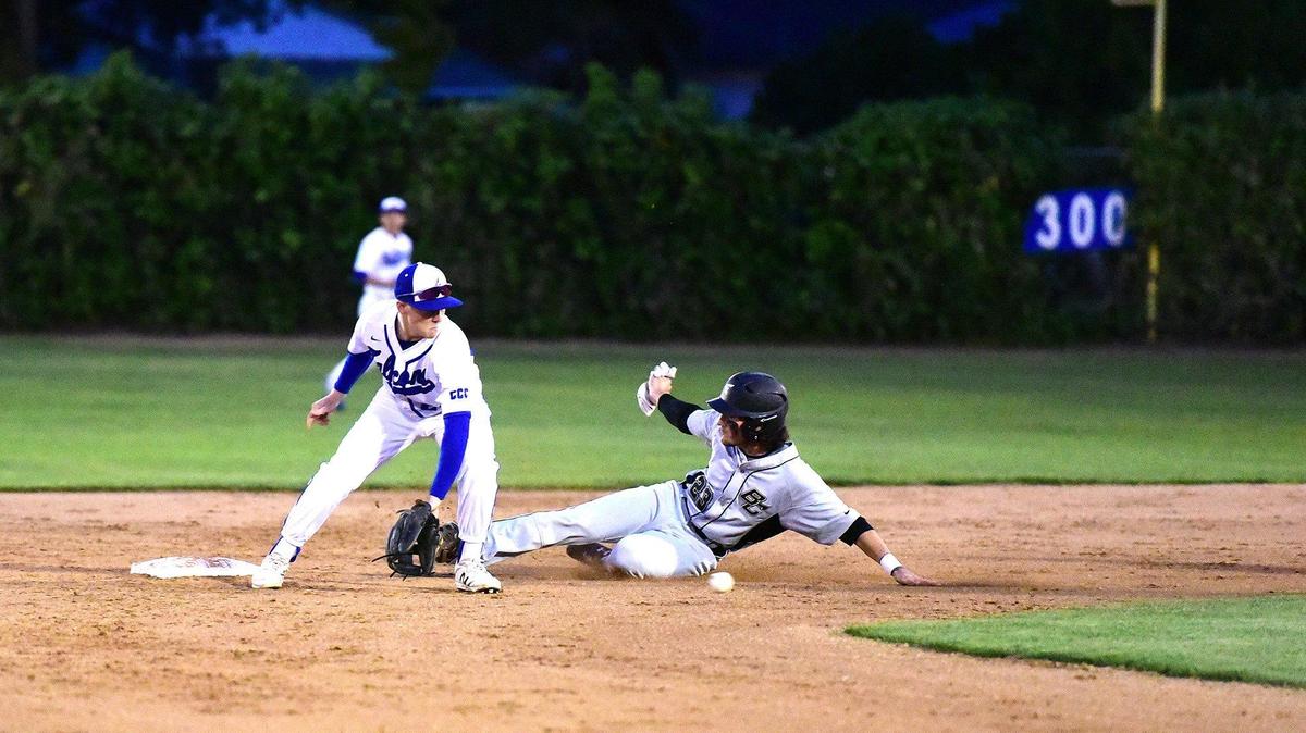 Buhach Colony senior Brendan Ekizian (23) slides safely into second base as Atwater junior Gunnar Kale (24) fields the throw during a game at Atwater Memorial Ballpark in Atwater, Calif., on Thursday, April 4, 2019. The Thunder beat the Falcons 2-0.