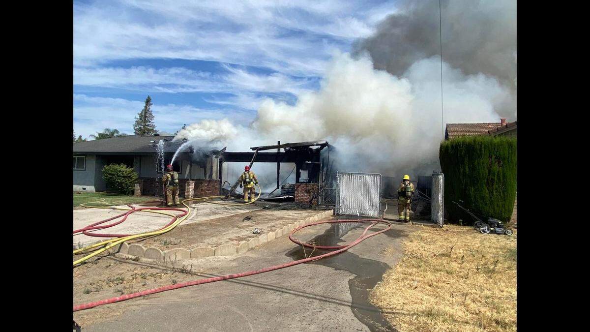 Firefighters from Merced County Fire and Atwater City Fire responded to a structure fire near Juniper Avenue and Castle Street in Atwater, Calif. on Tuesday, Aug. 2, 2022.