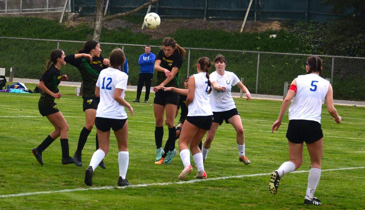 Hilmar High School sophomore Sidney Logsdon goes up for a header during the Northern California Regional Division V semifinal match against University Prep on Thursday, Feb. 29, 2024 at Hilmar High School.