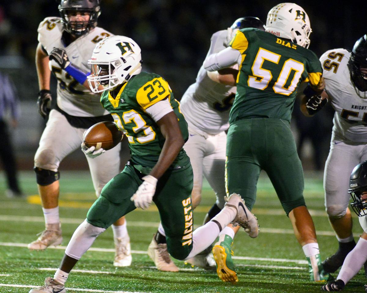 Hilmar running back Issac Sharp (23) sprints upfield during the Division VI CIF Sac-Joaquin championship game between Ripon Christian and Hilmar at Turlock High School in Turlock CA on November 30, 2018.