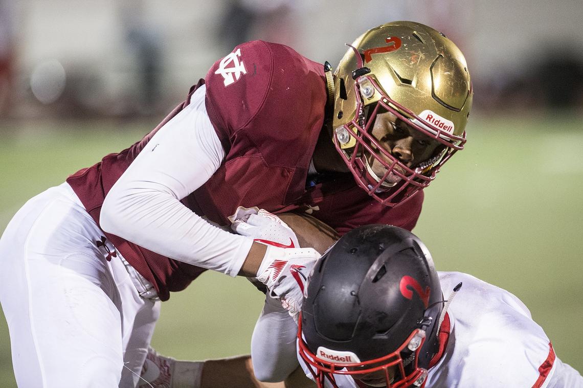 Golden Valley senior Etrell Bowers (2) is hit after catching a pass along the sideline during a game against Cordova in the CIF Sac-Joaquin Section Playoffs at Golden Valley High School in Merced, Calif., on Friday, Nov. 2, 2018.