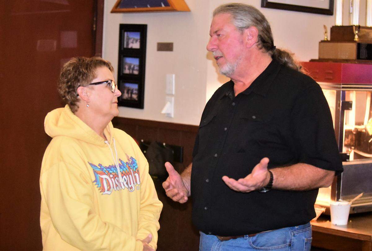 City Council District 4 candidate Casey Steed speaks with Atwater’s Chi Chi Wood as they wait for the election results to come in at the Elk’s Lodge in Merced, Calif. on Tuesday, Nov. 8, 2022.