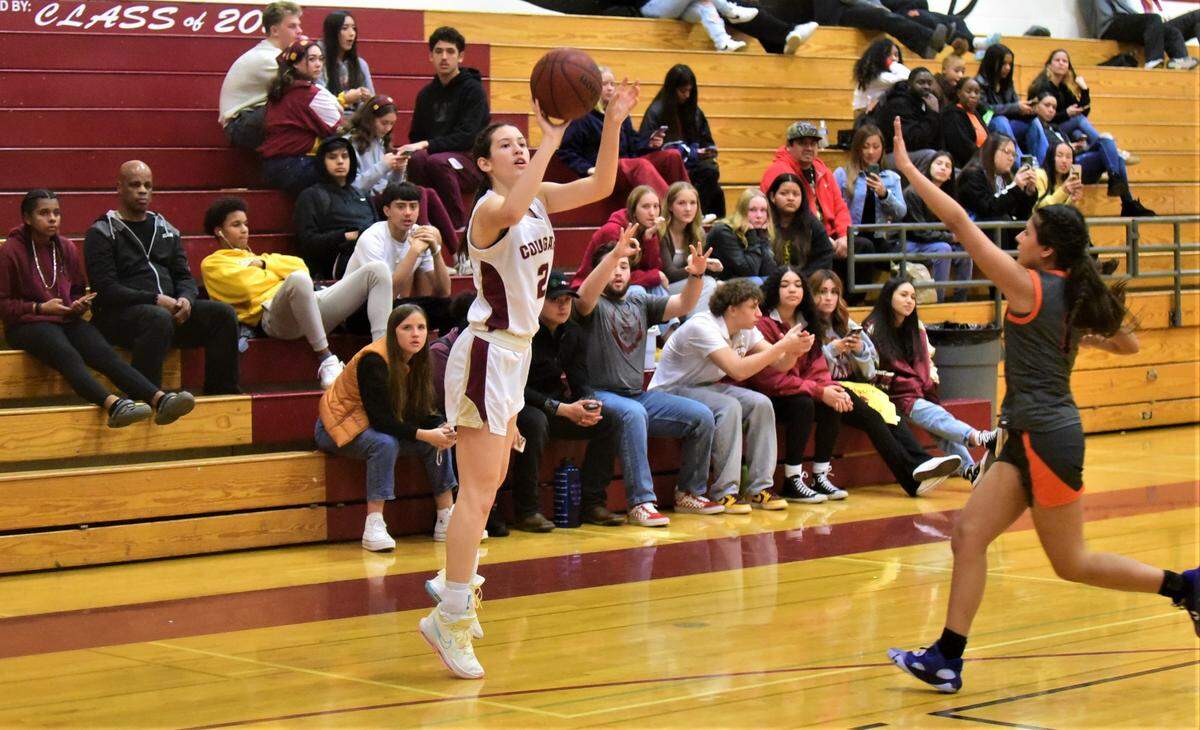 Golden Valley High School freshman Zoe Gonzales fires a shot from outside during a game against Merced High School on Thursday, Jan. 19, 2023 at Cougar Arena.