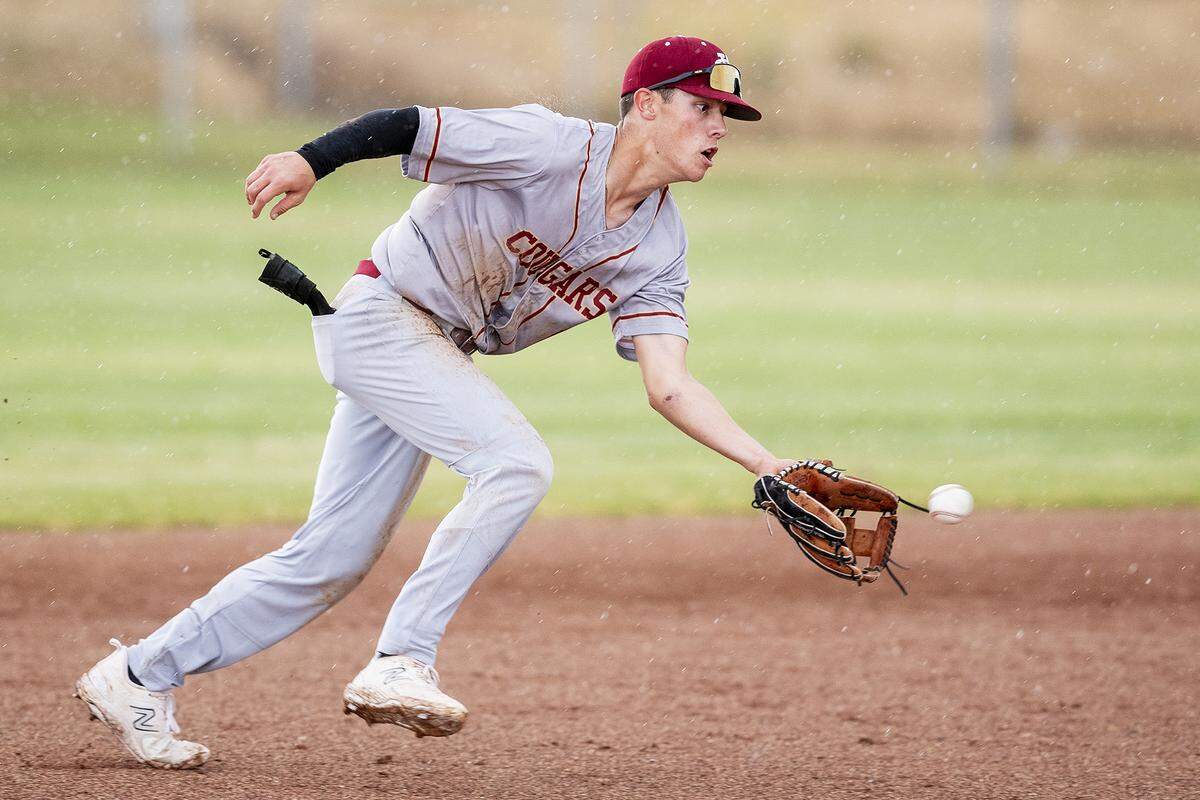 Golden Valley junior Koen Heupel (6) fields a ground ball before throwing to first to record an out during a game against Buhach Colony at Buhach Colony High School in Atwater, Calif., on Thursday, May 4, 2023.